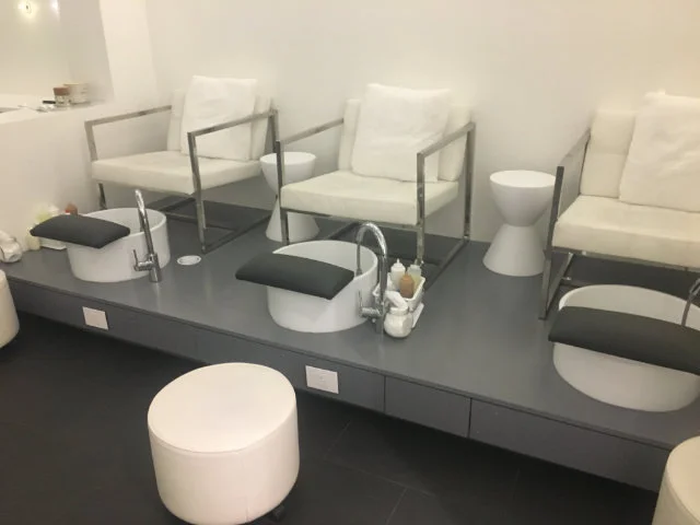 Salon pedicure stations after being reupholstered by Locatelli-Smith Interiors