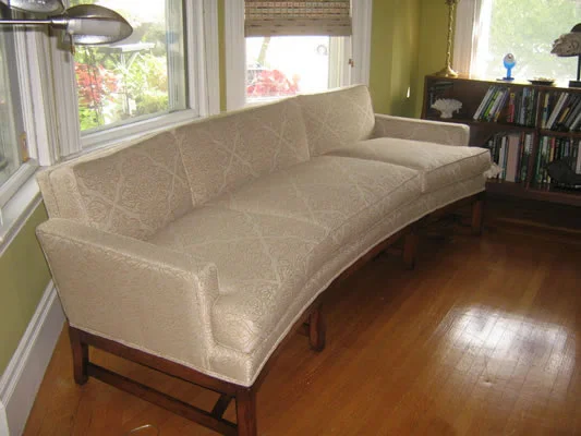 Kidney sofa after being professionally reupholstered by Locatelli-Smith Interiors