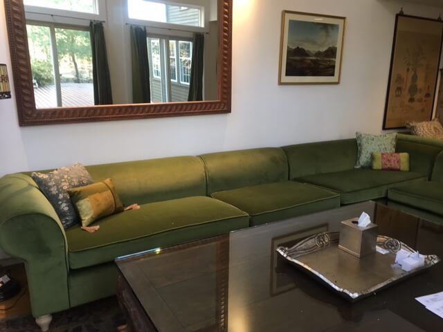 reupholstered green sofa