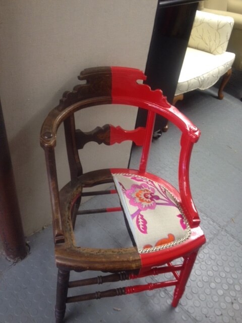 half restored chair shows the benefits of reupholstery services