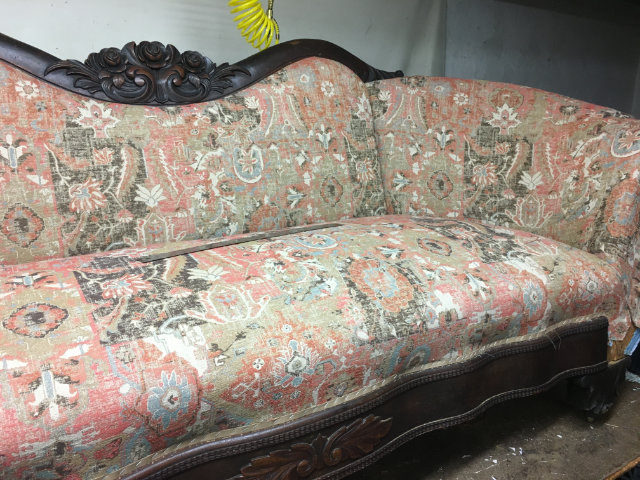 reupholstered antique sofa