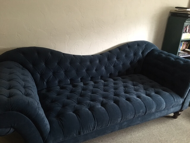 reupholstered rolling blue sofa