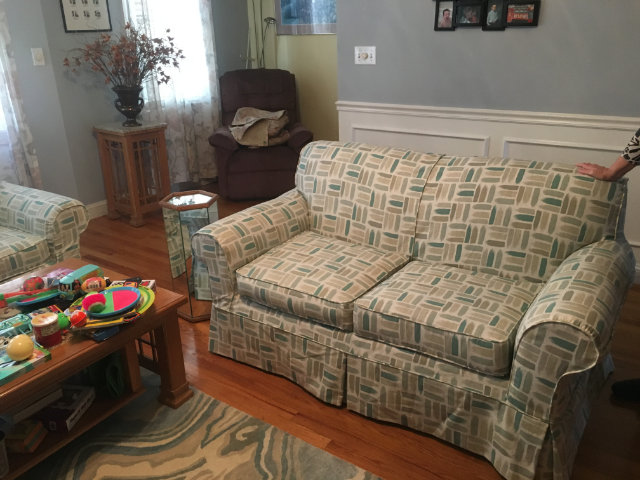 custom slipcovered loveseat with geometric pattern