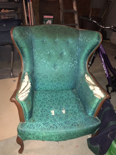 Traditional chair before being reupholstered