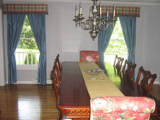Upholstered parsons chairs, drapes, custom cornices