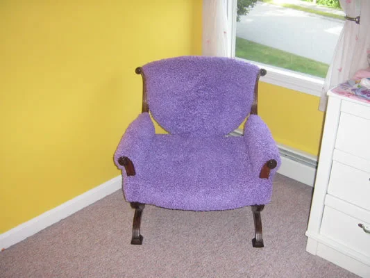 Updated fun reupholstery fabric on a traditional chair adds a whimsical feel to a space